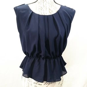 EUC navy Flowey Peplum blouse